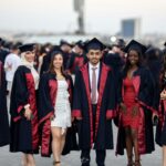 Graduates in academic gowns and caps